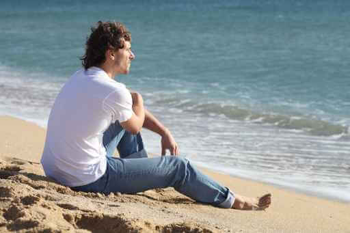 guy on beach after our heroin detoxification treatment in florida